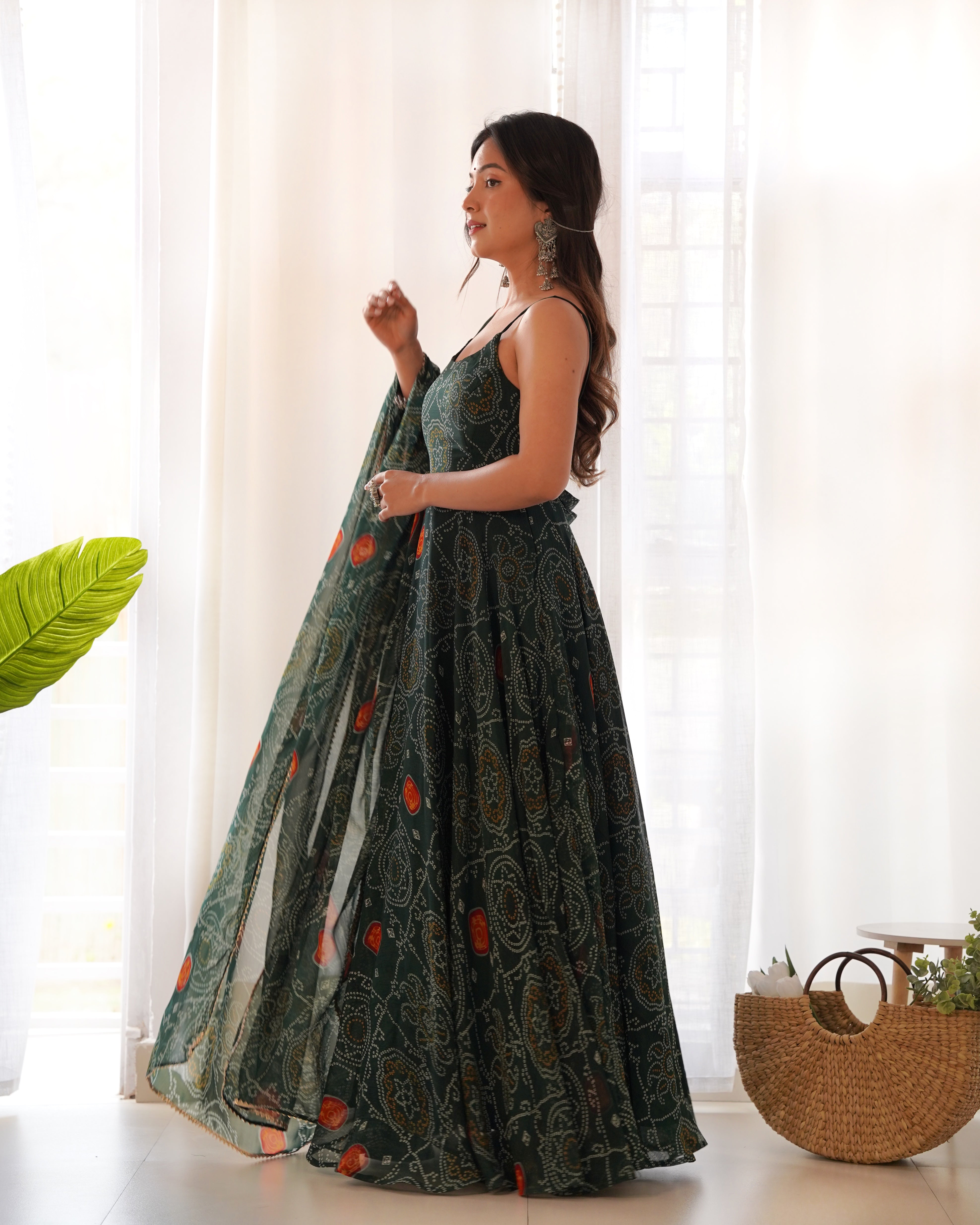 Enchanting Green Bandhani Printed Chiffon Gown for Festive Occasions