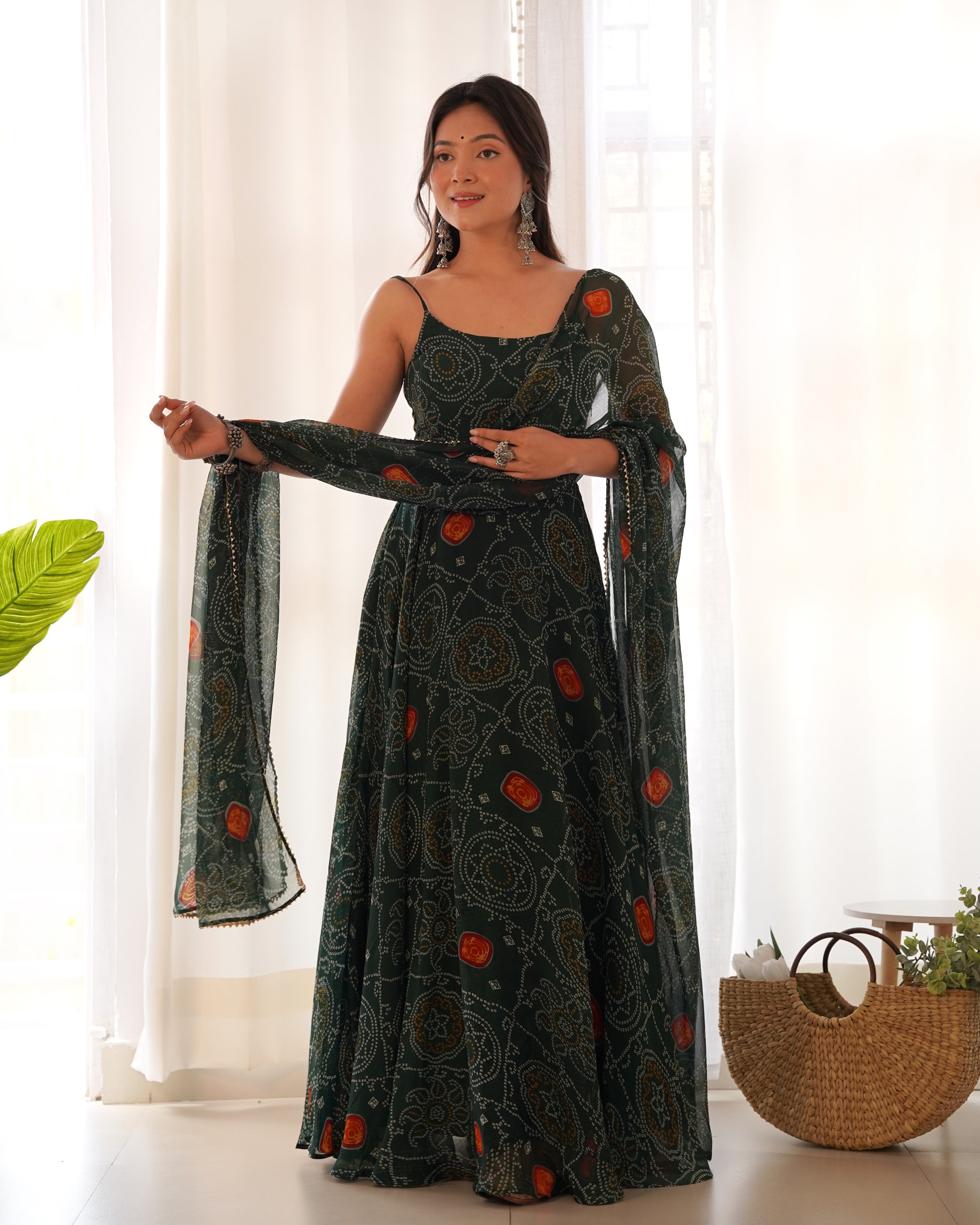 Enchanting Green Bandhani Printed Chiffon Gown for Festive Occasions
