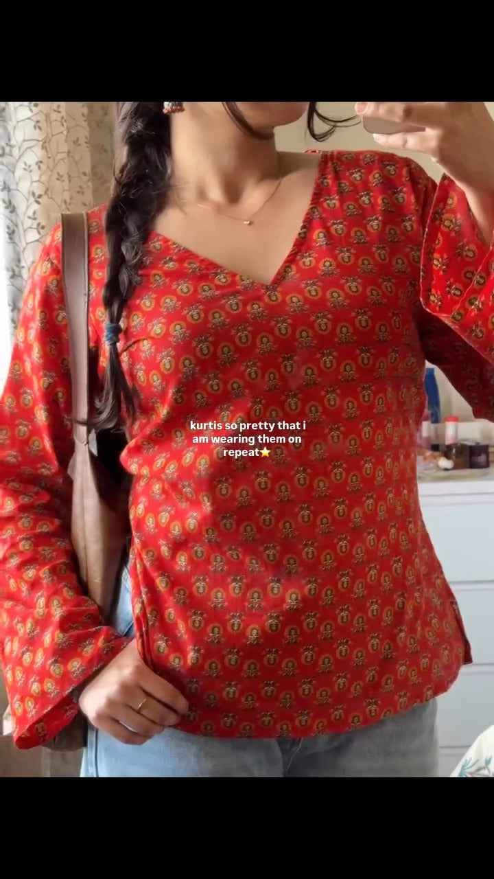 blue, printed short kurti.( fabric is likely breathable, Poly rayon)