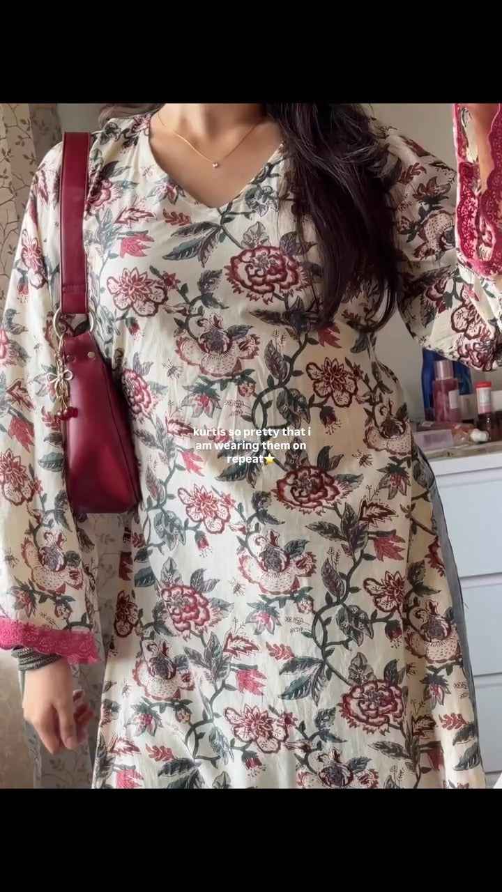 blue, printed short kurti.( fabric is likely breathable, Poly rayon)