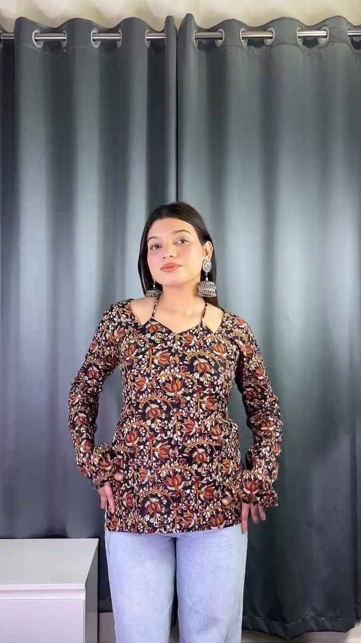 floral printed top or tunic( fabric is likely breathable, Poly rayon)