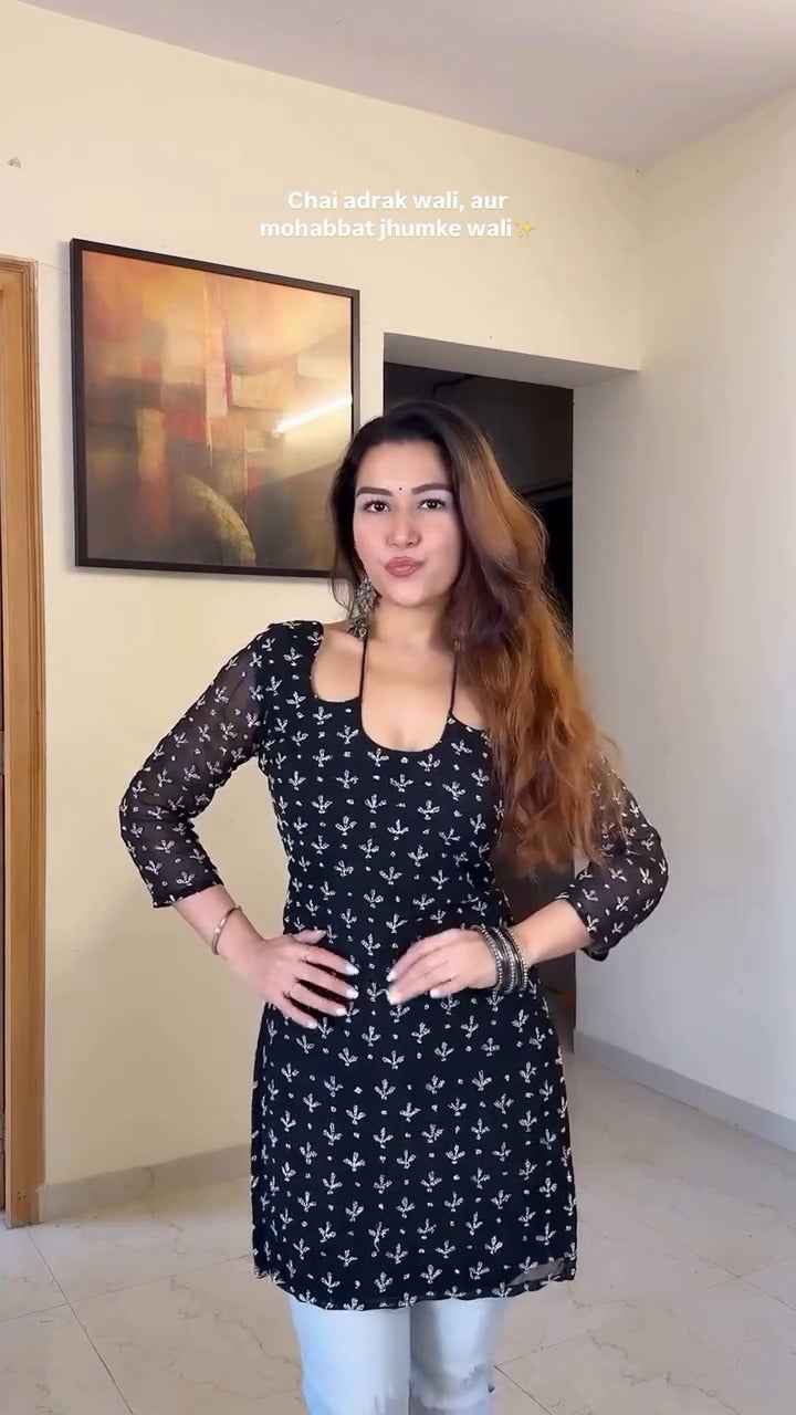 stunning black kurti with delicate prints,