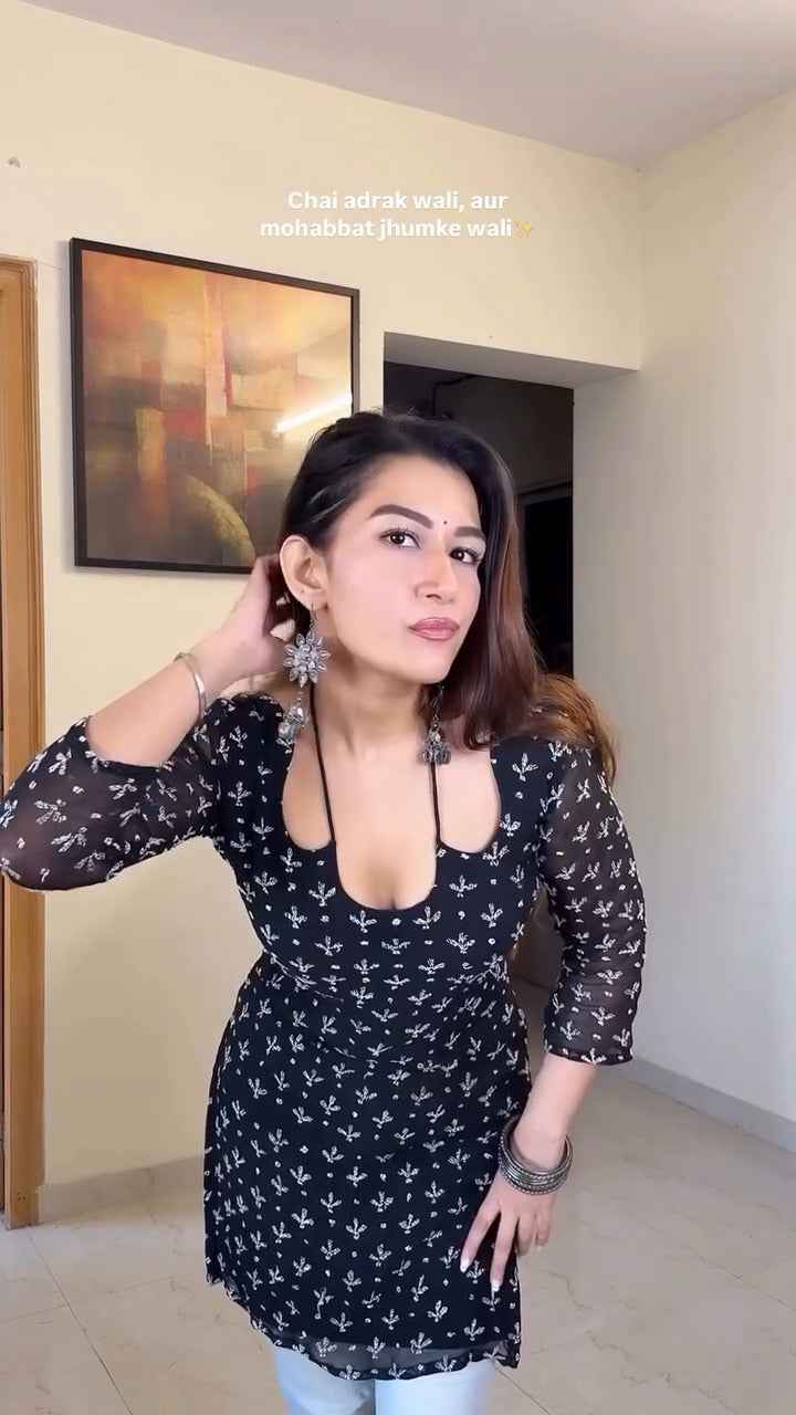 stunning black kurti with delicate prints,